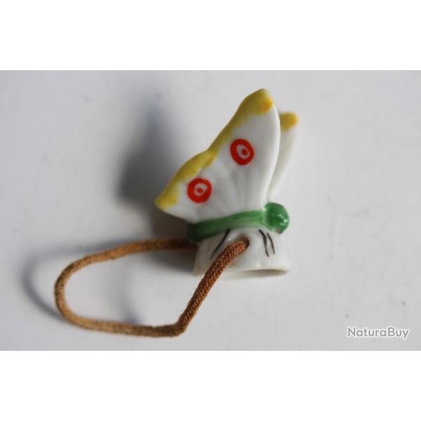 Pare gouttes porcelaine pour thire Papillon th