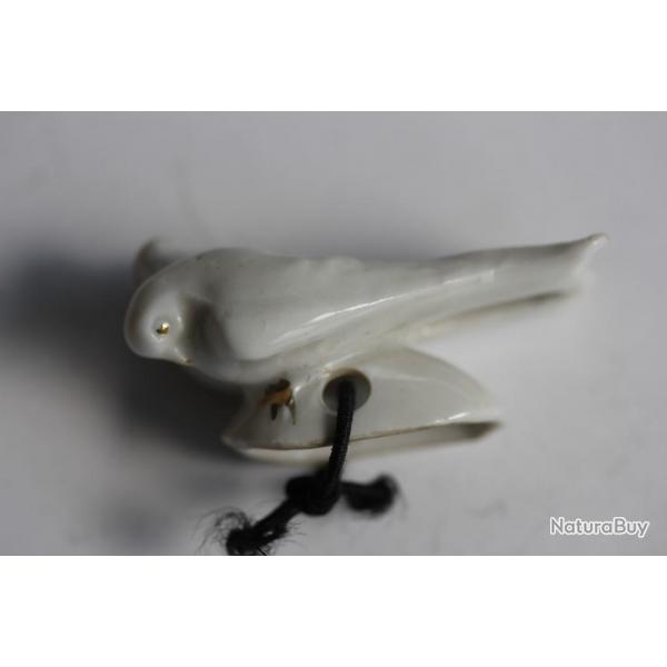 Pare gouttes porcelaine pour thire Couple d'oiseaux th
