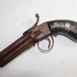 Ancien pistolet à poudre noire 6 canons tournants