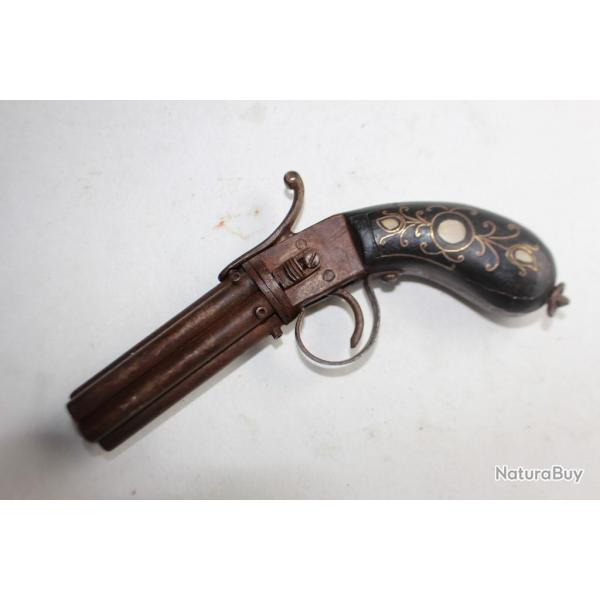 Ancien pistolet  poudre noire 6 canons tournants