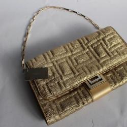 LANCEL Pochette East west cuir veau dorée