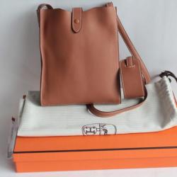 HERMES Sac Pochette uniforme bandoulière Onimaitou cuir marron