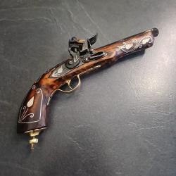 Pistolet a silex décoratif avec incrustation de nacre