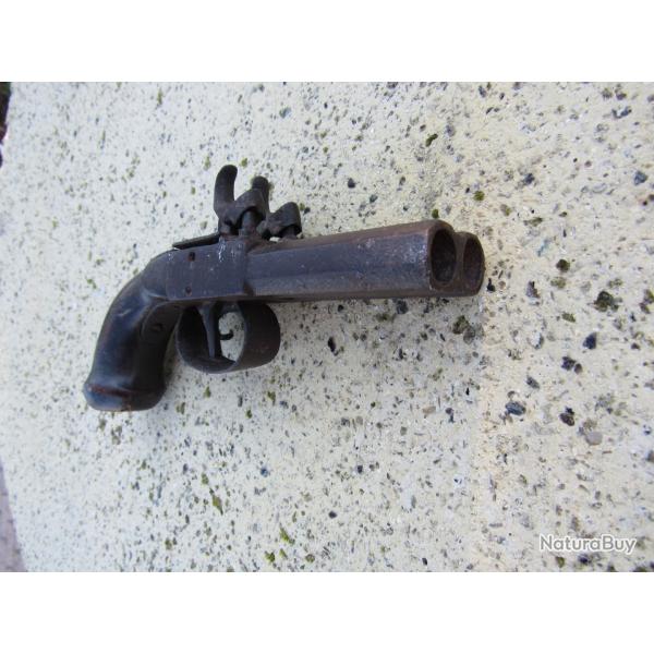 Pistolet double canon  broche a restaurer ou pour pices