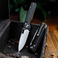 Couteau TRIVISA Sabretooth-BG Black Crossbar Lock Lame Acier 14C28N Manche G10 TVTY29BG14
