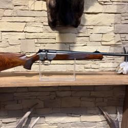Carabine Blaser R93 Keiler Cal. 9.3x62 + boule bois + queue de détente dorée