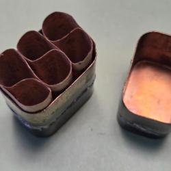 Une boite laiton vide pour cartouches 1892 ,étanche règlementaire
