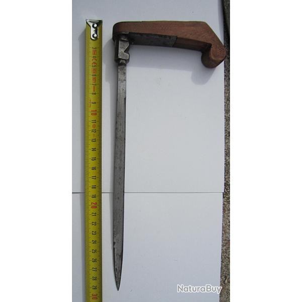 Pommeau d'une ancienne canne épée à l'équerre ..