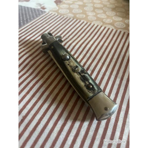 Couteau pliant a systme d'ouverture