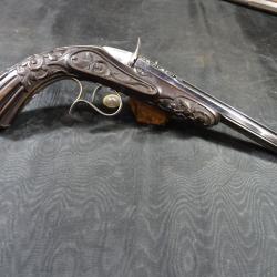 pistolet de salon 6 mm crosse très ouvragée Napoléon III signé Jules PAIN gravure argent