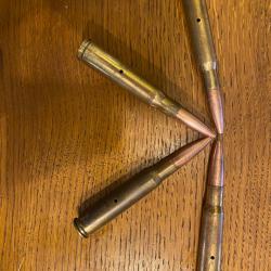 Lot quatre cartouches 12.7x99mm Inerte.
