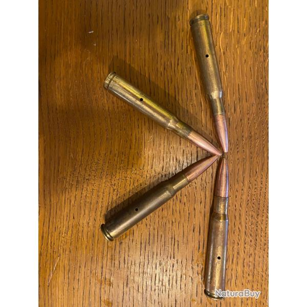 Lot quatre cartouches 12.7x99mm Inerte.