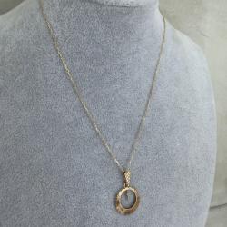 Collier avec pendentif en or 18 carats - Pendentif solaire