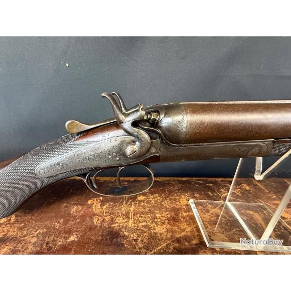 FUSIL JUXTAPOS J. WARRICK Cal. 12/65 dans son coffret