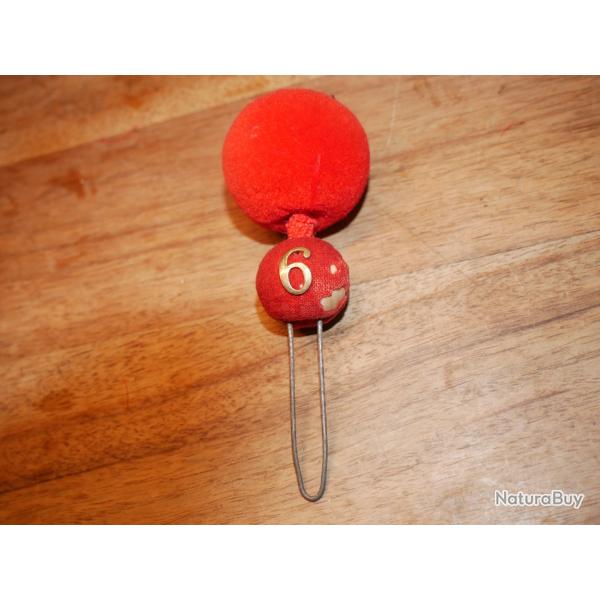 Pompon rgiment rouge second Empire, mit sur un ct