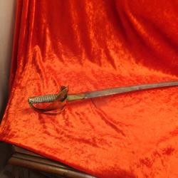 Sabre d'enfant, en fer et pogné en laiton avec filigrane