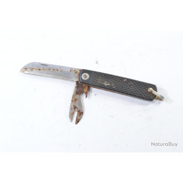 Couteau de poche militaire Arme Grec Grce 1973. Surplus parachutiste. Mauvais tat