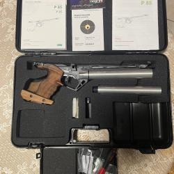 Vends Pistolet air comprimé Feinwerkbau P85 (5 coups) comme neuf
