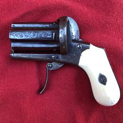 BELLE POIVRIERE DE POCHE ARENDT CAL7MM A BROCHE CROSSE IVOIRE VERS 1860