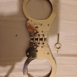 Paire de menottes à charnières Alcyon