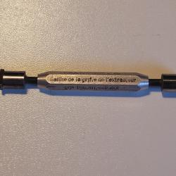 Vérificateur de saillie de la griffe de l'extracteur