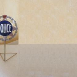 Ancienne plaque de poitrine en métal Police Nationale (99.M)