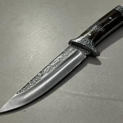 Couteau Russe manche bois de rose lame sculptée Loup enchère